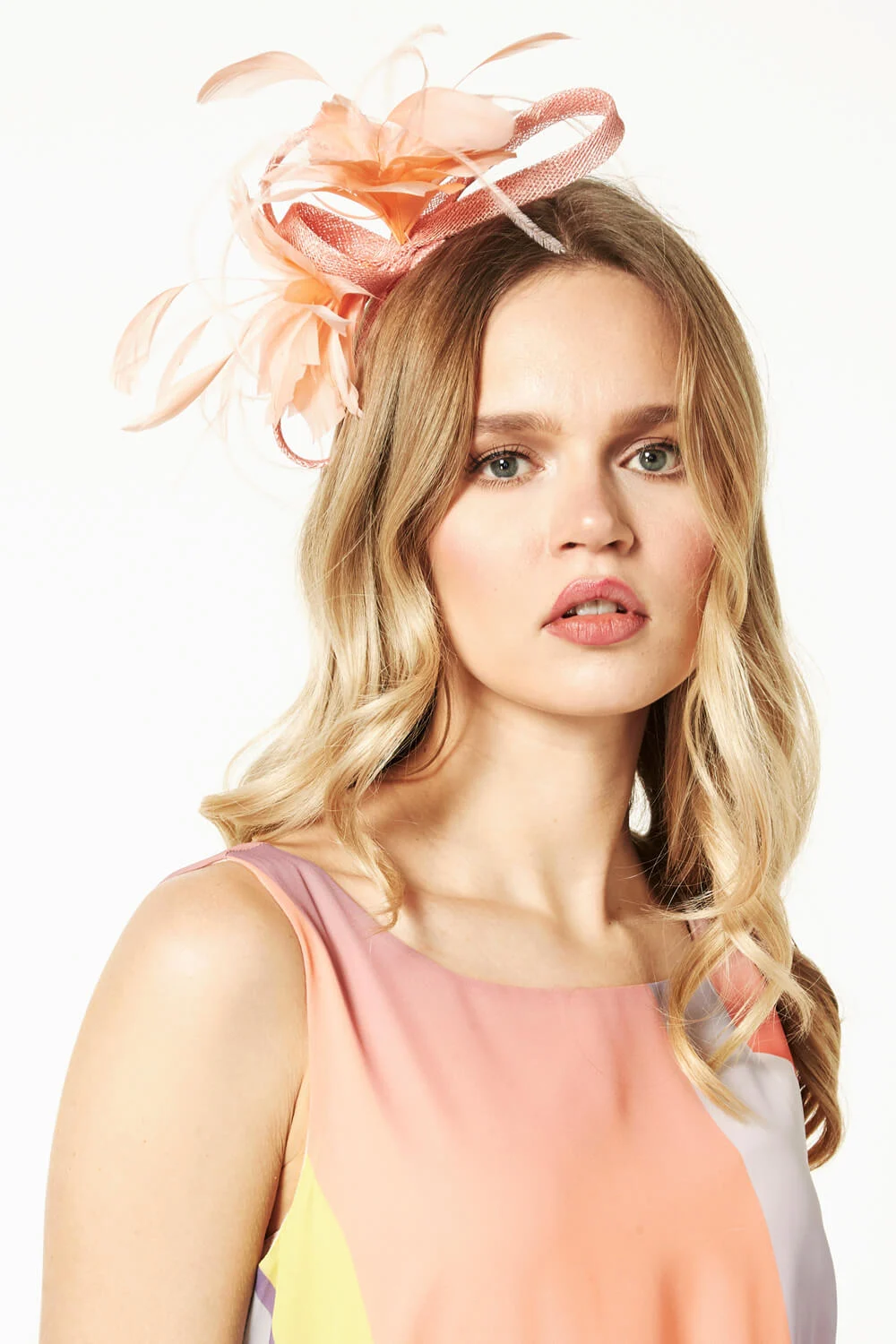 Roman Originals Loop and Feather Band Fascinator in Coral