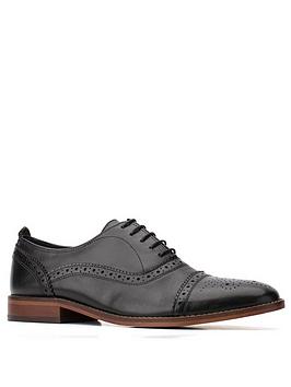 Base London cast brogues in black leather Black