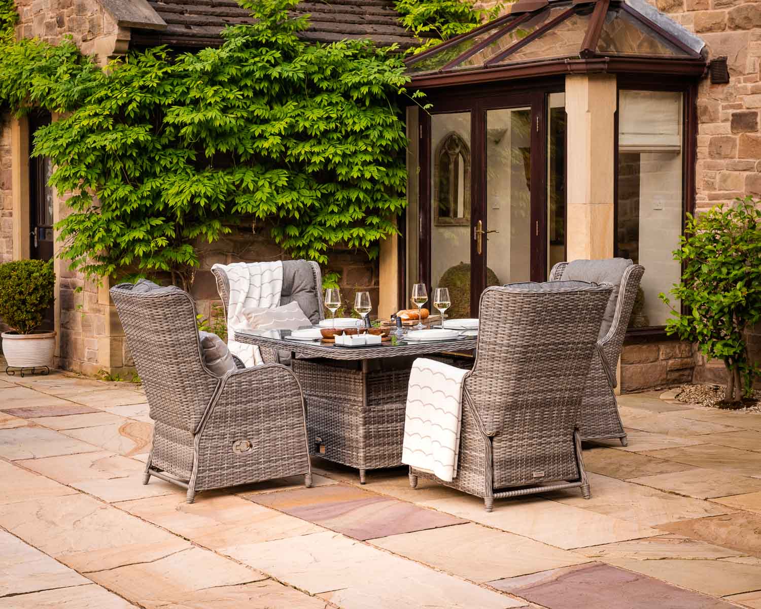 Rattan Direct Fiji 8 Reclining Rattan Garden Chairs &amp; Large Round Fire Pit Dining Table in Grey