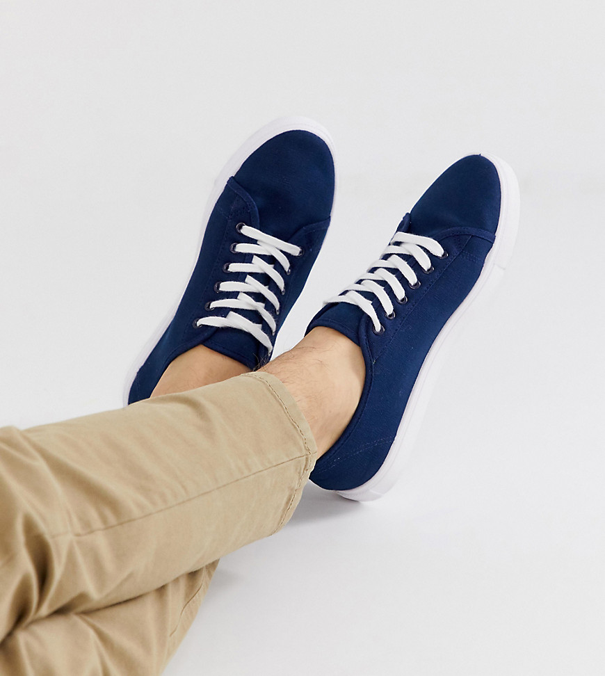 ASOS DESIGN Wide Fit trainers in navy canvas